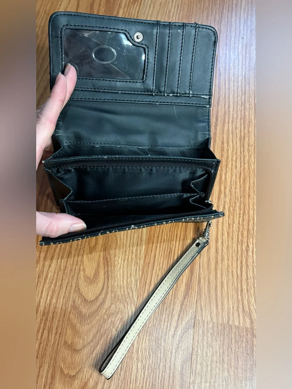 Guess wristlet featuring